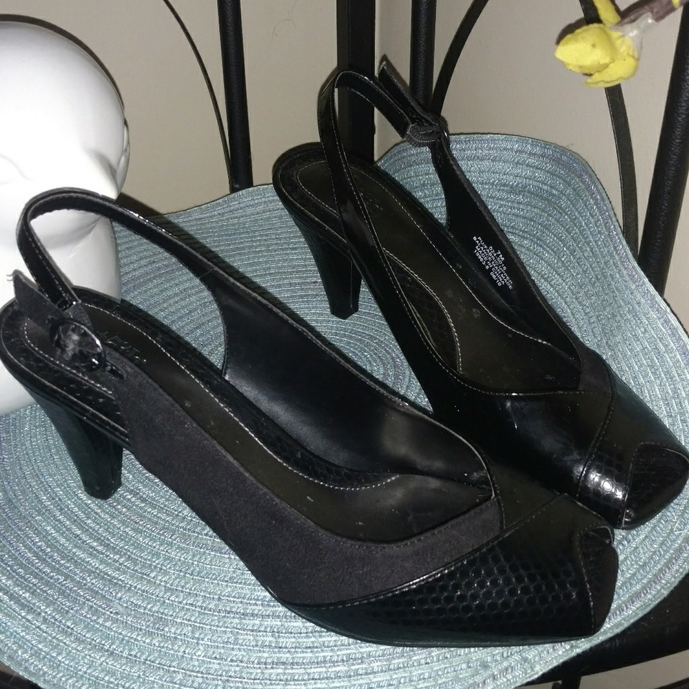 East 5th Snakeskin and patent, suede. Peep toe.